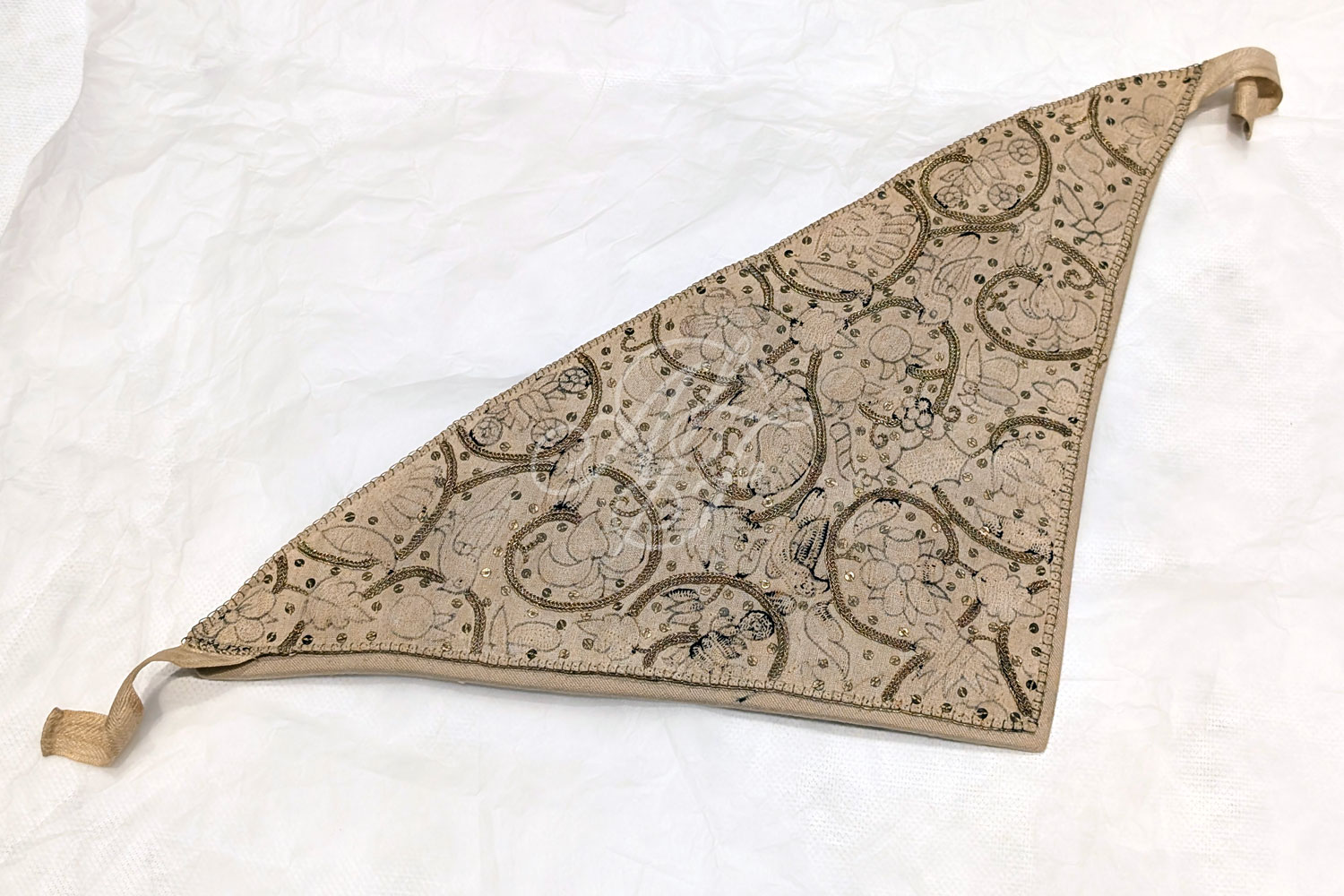 Linen forehead cloth dating from the early 17th century, with blackwork and goldwork embroidery